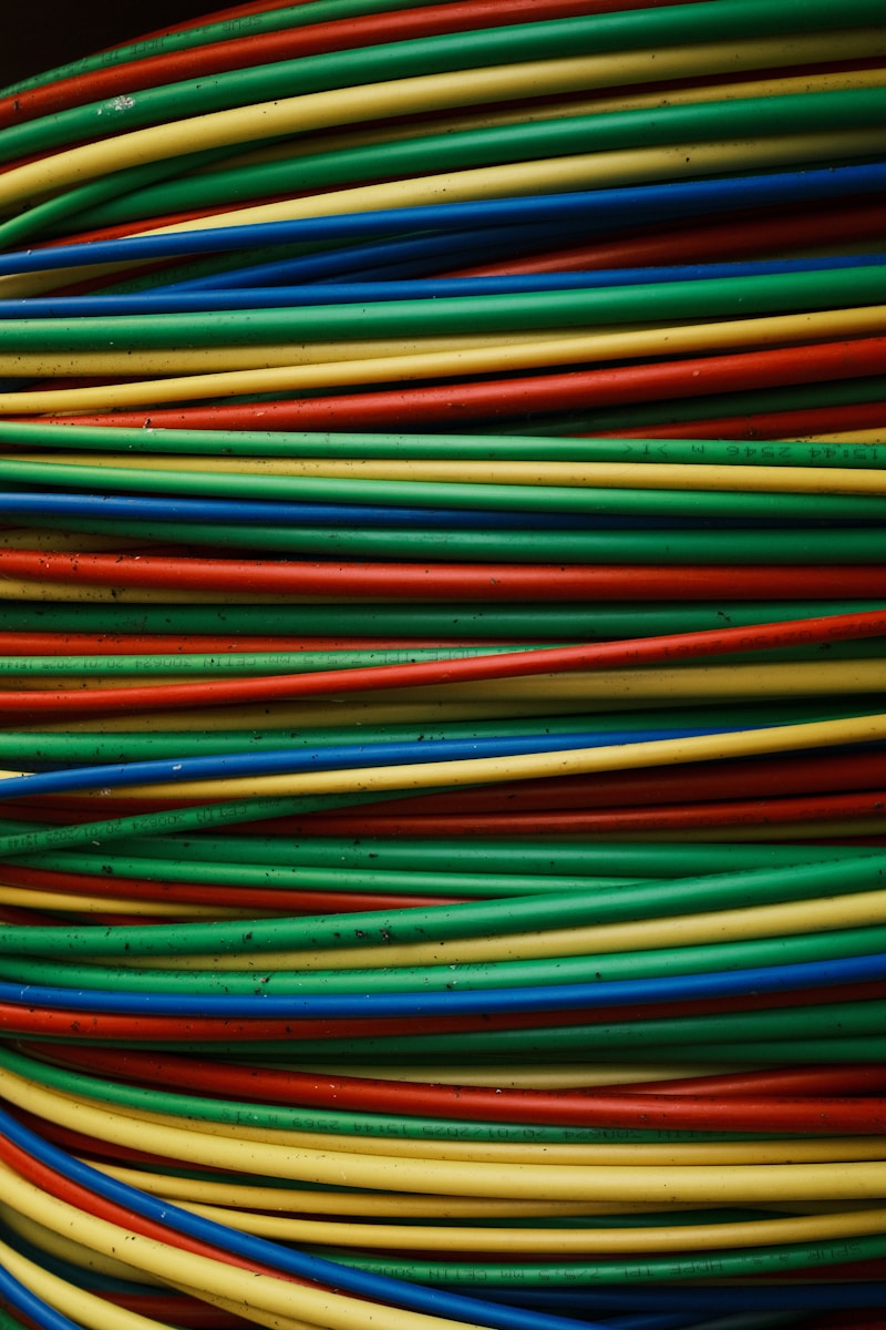Colorful wires are stacked together in a bundle.